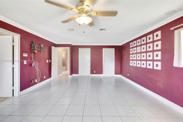 2730 NW 105th Ter, Coral Springs, FL 33065 - tiled empty room with ceiling fan, crown molding, and baseboards