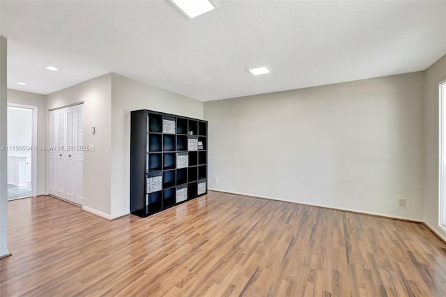 2730 NW 105th Ter, Coral Springs, FL 33065 - unfurnished room featuring light wood-style flooring, baseboards, and recessed lighting