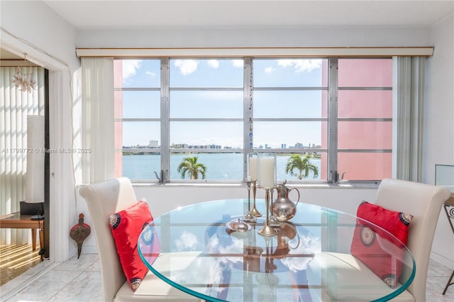 18555 NE 14th Ave Unit 612, Miami, FL 33179 - dining space featuring a water view and a city view