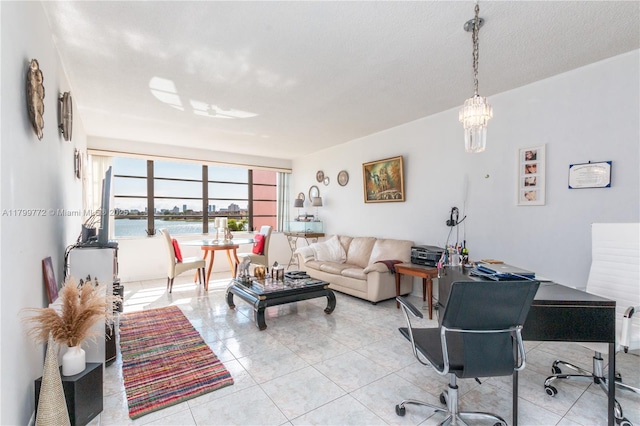 18555 NE 14th Ave Unit 612, Miami, FL 33179 - living room with light tile patterned flooring and a chandelier