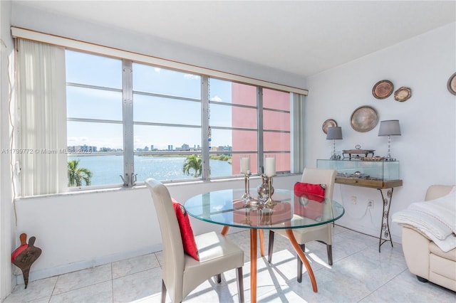 18555 NE 14th Ave Unit 612, Miami, FL 33179 - tiled dining space with a water view and a city view
