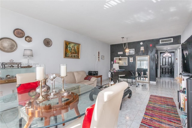 18555 NE 14th Ave Unit 612, Miami, FL 33179 - living area with an accent wall and wallpapered walls