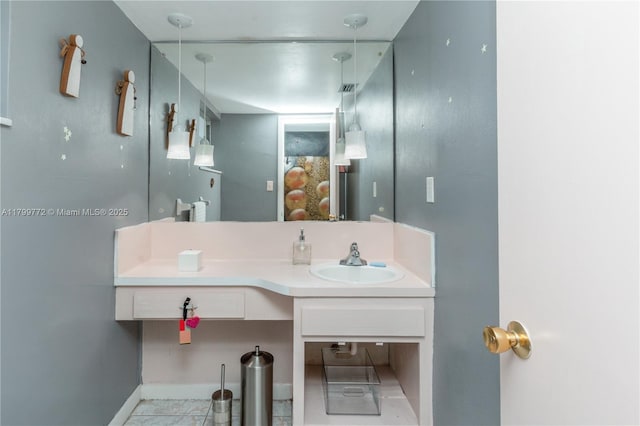 18555 NE 14th Ave Unit 612, Miami, FL 33179 - bathroom featuring baseboards and vanity