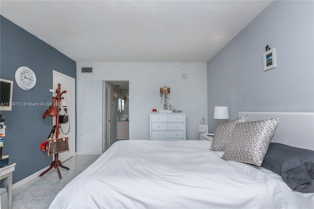 18555 NE 14th Ave Unit 612, Miami, FL 33179 - bedroom with ensuite bath