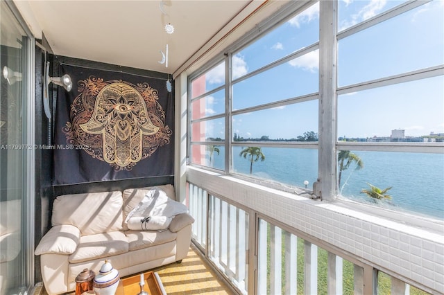 18555 NE 14th Ave Unit 612, Miami, FL 33179 - sunroom featuring a water view