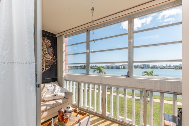 18555 NE 14th Ave Unit 612, Miami, FL 33179 - sunroom featuring a water view