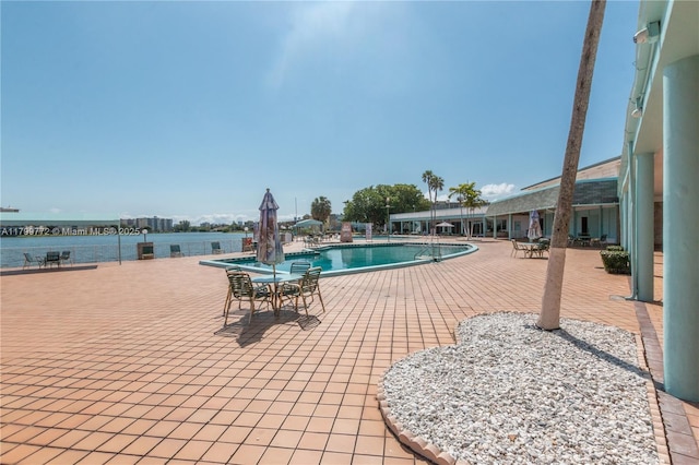 18555 NE 14th Ave Unit 612, Miami, FL 33179 - community pool with a patio area and a water view