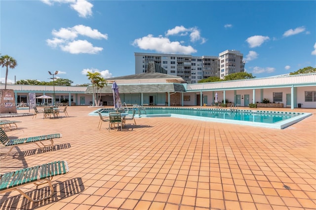 18555 NE 14th Ave Unit 612, Miami, FL 33179 - community pool featuring a patio area