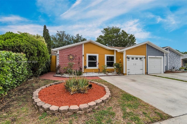9821 W Fern Ln, Miramar, FL 33025 - view of front of home featuring concrete driveway and a garage