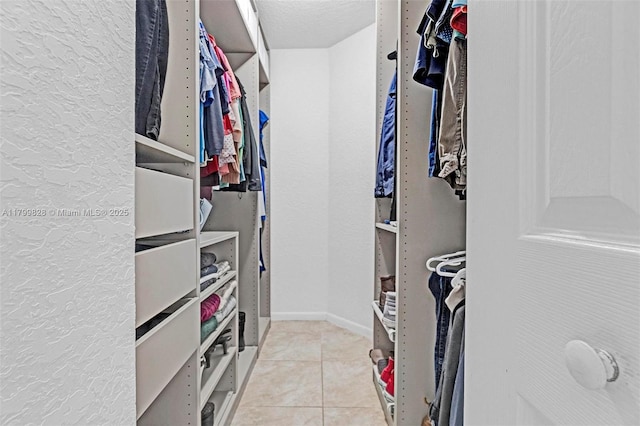 9821 W Fern Ln, Miramar, FL 33025 - spacious closet featuring tile patterned floors