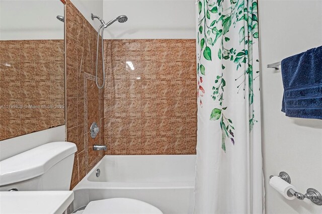 9821 W Fern Ln, Miramar, FL 33025 - full bathroom featuring shower / tub combo with curtain and toilet