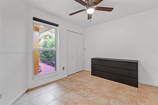 9821 W Fern Ln, Miramar, FL 33025 - spare room with ceiling fan, tile patterned flooring, and baseboards