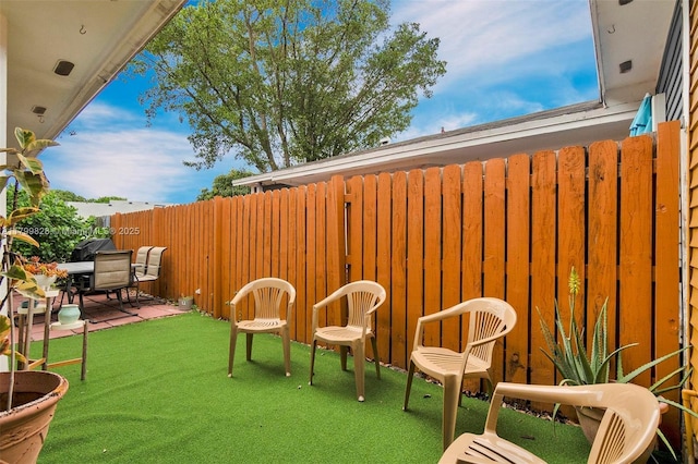 9821 W Fern Ln, Miramar, FL 33025 - view of yard featuring fence and a patio area