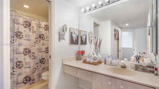 bathroom with toilet, tile patterned floors, vanity, recessed lighting, and curtained shower