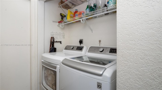 washroom with washer and clothes dryer