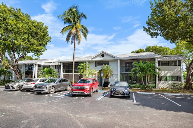 933 NE 199th St Unit 207, Miami, FL 33179 - view of property with uncovered parking