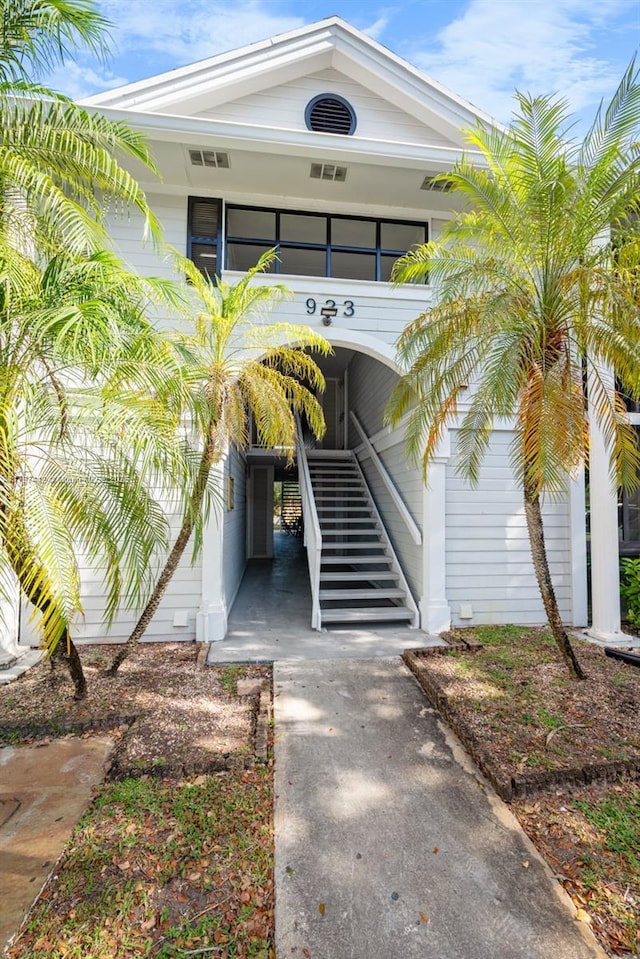 933 NE 199th St Unit 207, Miami, FL 33179 - entrance to property with driveway and a carport
