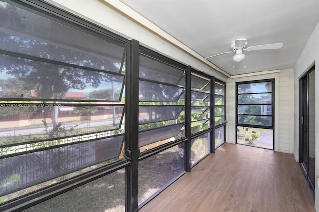 933 NE 199th St Unit 207, Miami, FL 33179 - unfurnished sunroom featuring a ceiling fan