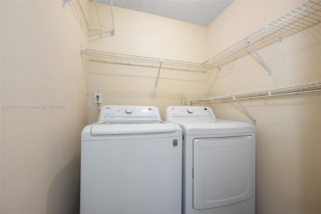 933 NE 199th St Unit 207, Miami, FL 33179 - laundry room featuring washer and clothes dryer