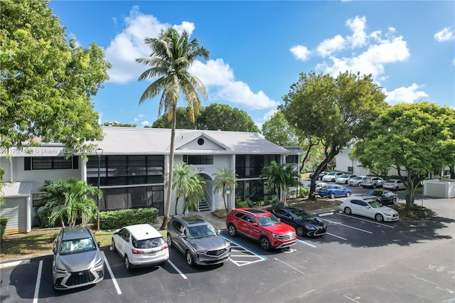 933 NE 199th St Unit 207, Miami, FL 33179 - view of uncovered parking lot