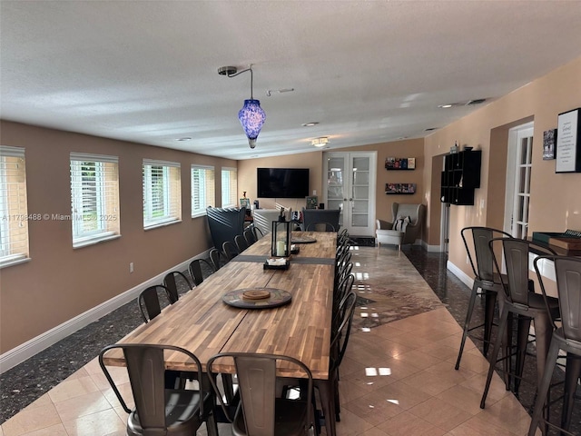 16195 SW 78th Ave, Palmetto Bay, FL 33157 - dining space with tile patterned flooring and french doors