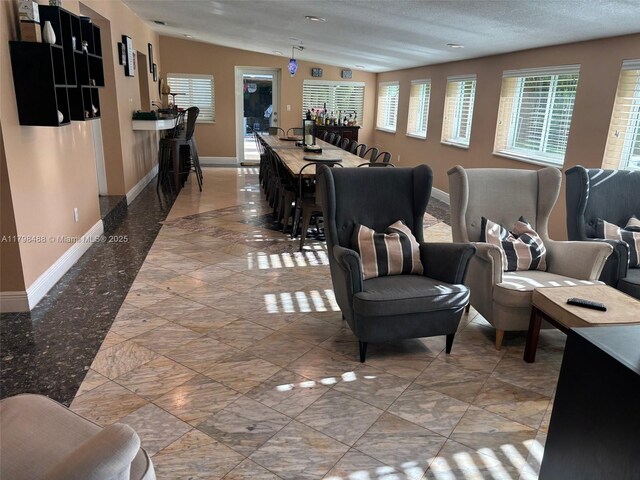 16195 SW 78th Ave, Palmetto Bay, FL 33157 - living room featuring baseboards
