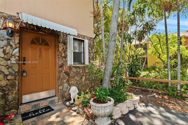 450 SE 7th St Unit 230, Dania Beach, FL 33004 - entrance to property featuring stone siding