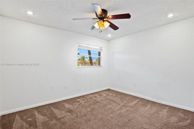 450 SE 7th St Unit 230, Dania Beach, FL 33004 - spare room featuring carpet floors, baseboards, a textured ceiling, a ceiling fan, and recessed lighting