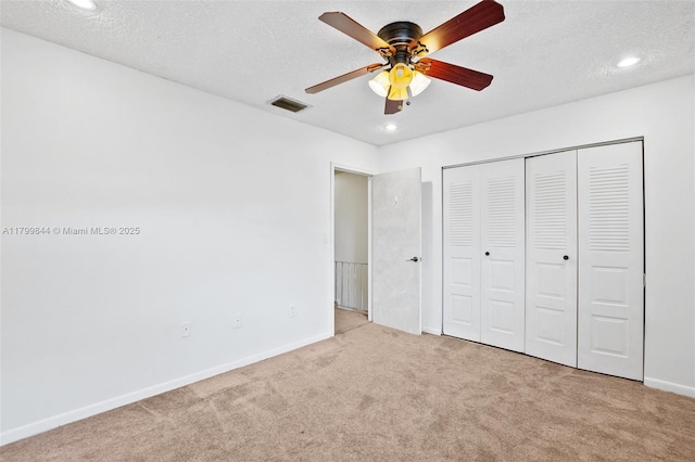 450 SE 7th St Unit 230, Dania Beach, FL 33004 - unfurnished bedroom with carpet floors, baseboards, recessed lighting, a closet, and a textured ceiling