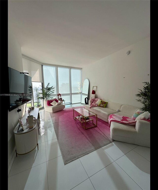 851 NE 1st Ave Unit 2208, Miami, FL 33132 - living room featuring a wall of windows and tile patterned floors