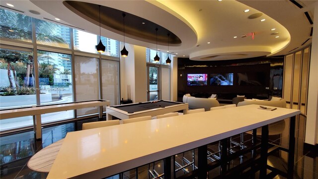 851 NE 1st Ave Unit 2208, Miami, FL 33132 - interior space featuring recessed lighting, a tray ceiling, and pendant lighting