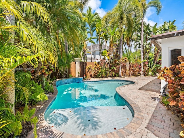 1730 NE 16th St, Fort Lauderdale, FL 33304 - view of pool with a fenced backyard and a patio area