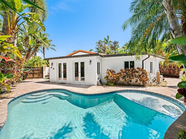 1730 NE 16th St, Fort Lauderdale, FL 33304 - outdoor pool with french doors and a patio