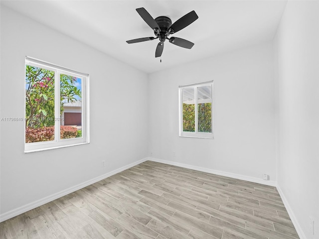 1730 NE 16th St, Fort Lauderdale, FL 33304 - unfurnished room featuring plenty of natural light, light wood finished floors, baseboards, and a ceiling fan