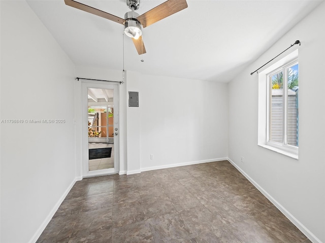 1730 NE 16th St, Fort Lauderdale, FL 33304 - spare room featuring ceiling fan, baseboards, and electric panel