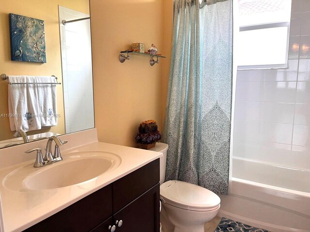 20028 SW Caserta Way, Port St Lucie, FL 34986 - full bathroom with toilet, shower / tub combo with curtain, and vanity