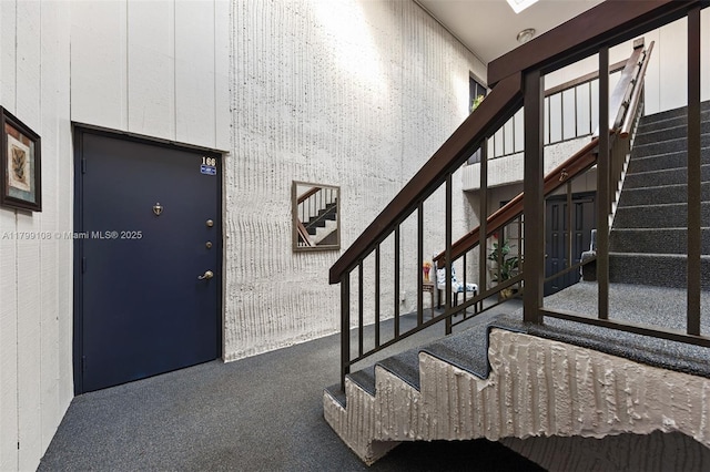 6668 Burning Wood Dr Unit 166, Boca Raton, FL 33433 - entrance foyer with stairway, carpet floors, and a high ceiling