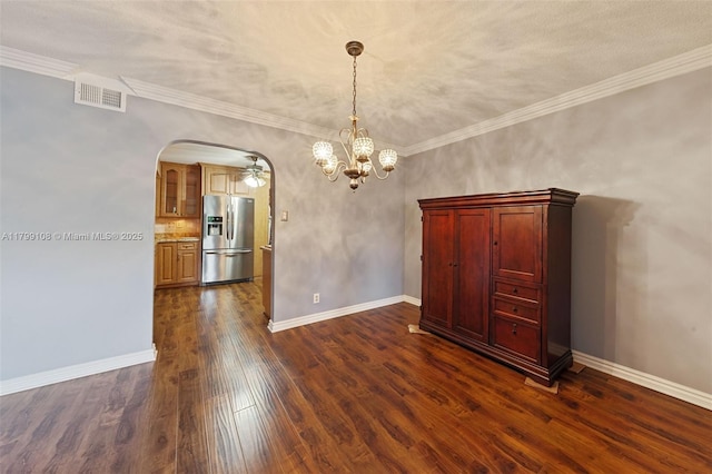 6668 Burning Wood Dr Unit 166, Boca Raton, FL 33433 - unfurnished dining area featuring a chandelier, dark wood-style floors, arched walkways, baseboards, and crown molding