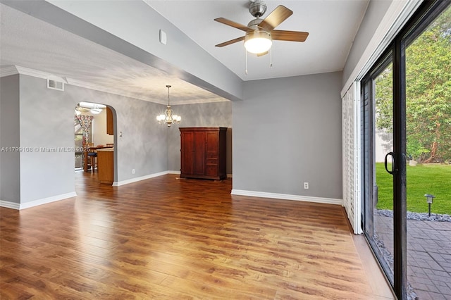 6668 Burning Wood Dr Unit 166, Boca Raton, FL 33433 - empty room with arched walkways, a chandelier, a ceiling fan, and baseboards