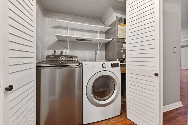 6668 Burning Wood Dr Unit 166, Boca Raton, FL 33433 - washroom with wood finished floors, independent washer and dryer, and baseboards