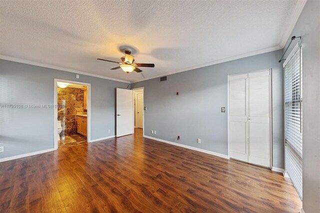6668 Burning Wood Dr Unit 166, Boca Raton, FL 33433 - unfurnished bedroom featuring a textured ceiling, ornamental molding, dark wood-style flooring, baseboards, and a ceiling fan