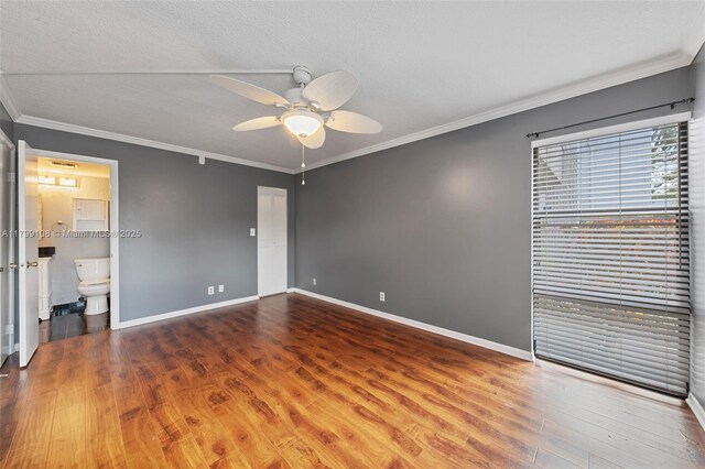 6668 Burning Wood Dr Unit 166, Boca Raton, FL 33433 - unfurnished bedroom featuring crown molding, wood finished floors, baseboards, and ceiling fan