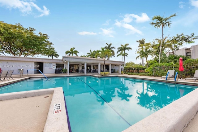 6668 Burning Wood Dr Unit 166, Boca Raton, FL 33433 - community pool featuring a patio