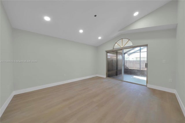 20076 NW 85th Ave, Hialeah, FL 33015 - empty room with lofted ceiling, wood finished floors, baseboards, and recessed lighting