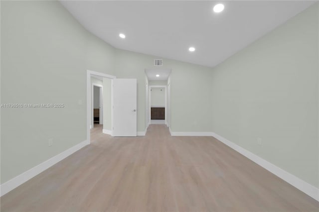 20076 NW 85th Ave, Hialeah, FL 33015 - empty room featuring baseboards, light wood-type flooring, vaulted ceiling, and recessed lighting