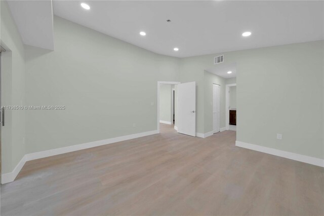 20076 NW 85th Ave, Hialeah, FL 33015 - spare room with light wood-style flooring, baseboards, and recessed lighting
