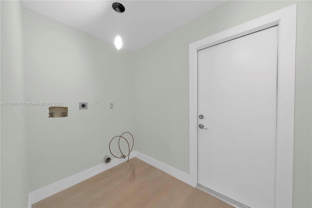 20076 NW 85th Ave, Hialeah, FL 33015 - laundry room featuring gas dryer hookup, hookup for an electric dryer, washer hookup, light wood finished floors, and baseboards