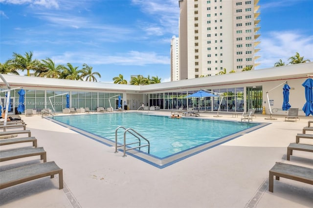 community pool featuring a patio area