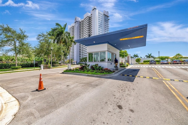 14951 Royal Oaks Ln Unit 1409, North Miami, FL 33181 - view of property with uncovered parking