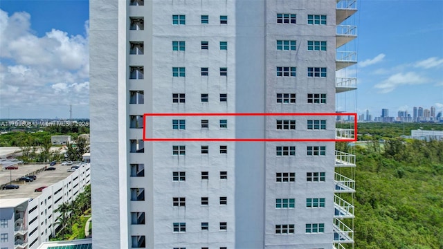 view of apartment building / complex with a view of city